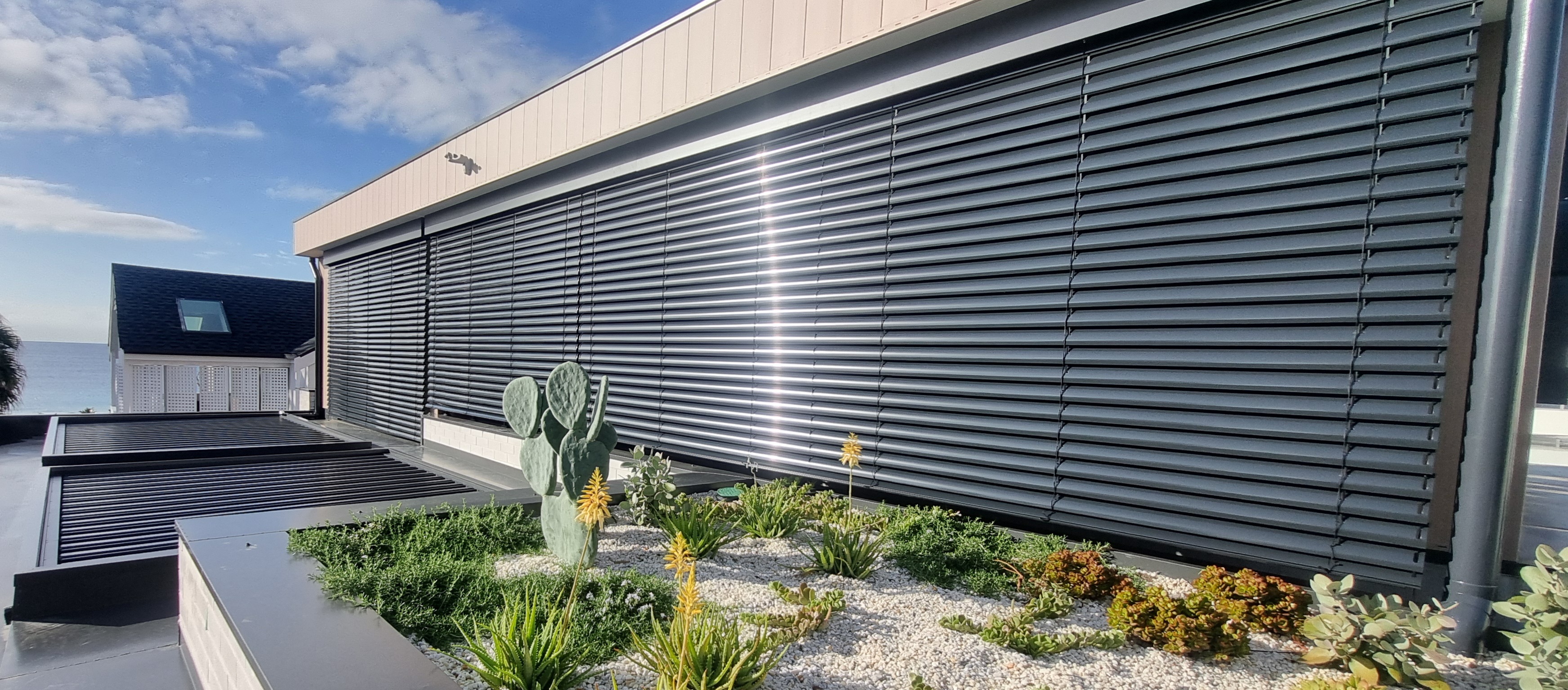 Large-scale architectural external venetian blind system — Shutters of Sydney